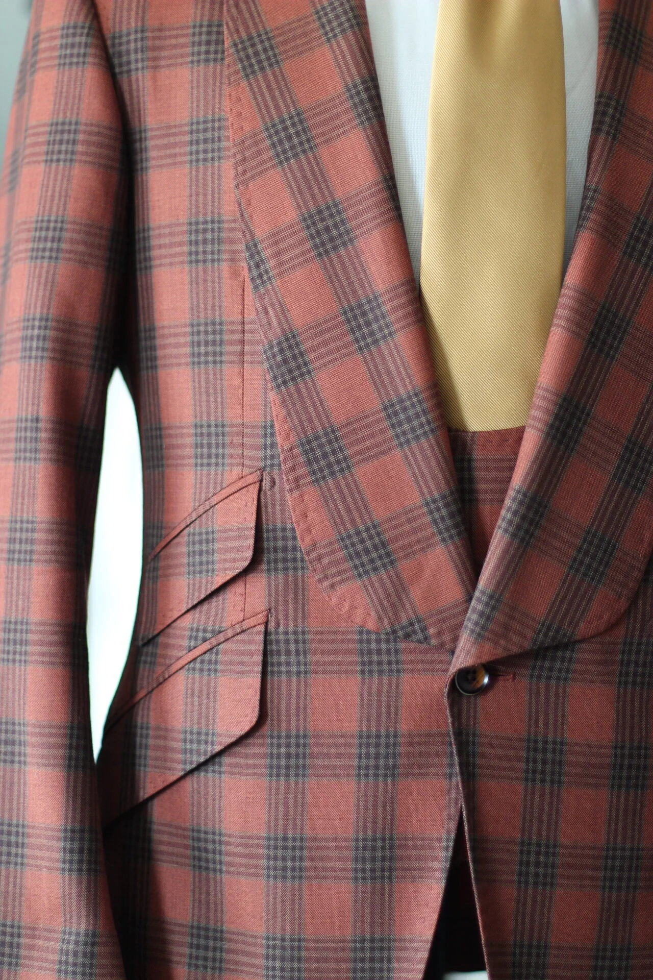 The Lucas Brothers Custom Menswear Plaid suit with ticket pockets and u-shaped vest